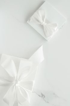 Romantic celebration, lifestyle and holiday present concept - Luxury wedding gifts on marble