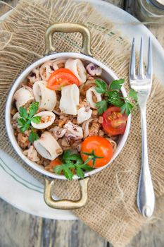 A traditional dish of Tuscany with farro and seafood