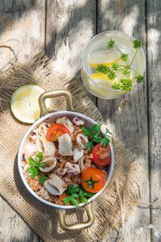 A traditional dish of Tuscany with farro and seafood