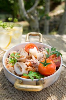 A traditional dish of Tuscany with farro and seafood