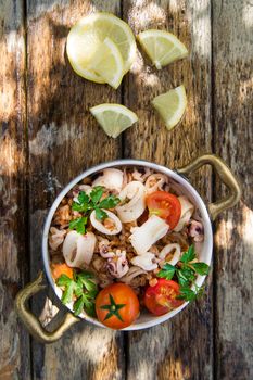 A traditional dish of Tuscany with farro and seafood