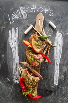 Lamb chops cooked on the grill with leek and red pepper