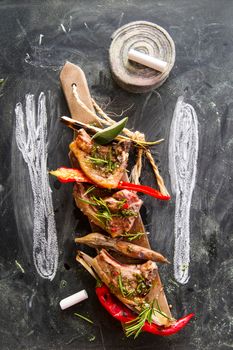 Lamb chops cooked on the grill with leek and red pepper