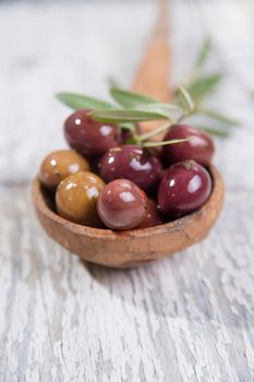 Italian food, snack of olives in brine presented in flat