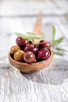 Italian food, snack of olives in brine presented in flat