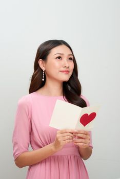 Beautiful asian girl with love letter. Happy woman day.