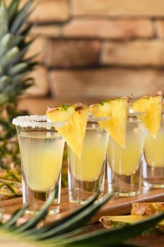 Double shots of tropical tequila with pineapple juice. This is definitely going to be a great party for Cinco de Mayo!