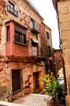 Narrow streets with Renaissance style houses and carved facades in Alcaraz, Castile-la Mancha community, Spain