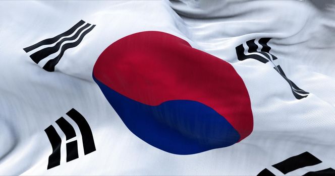 Detail of the national flag of South korea flying in the wind. Democracy and politics. The flag stands for the three components of a nation: the land, the people and the government