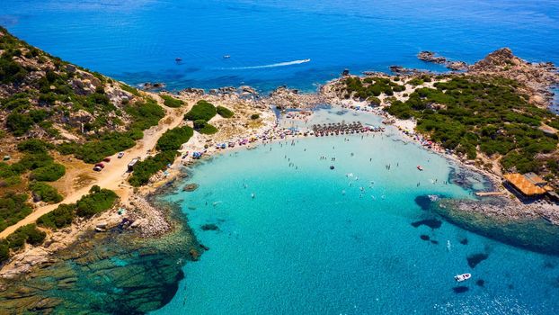 Cost of Sardinia: Peninsula of Punta Molentis. View of beautiful beach at Punta Molentis, Villasimius, Sardinia, Italy. Beautiful bay with sandy beach at Punta Molentis, Sardinia island, Italy.