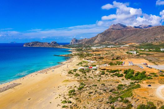 Aerial shot of beautiful turquoise beach Falasarna (Falassarna) in Crete, Greece. View of famous paradise sandy deep turquoise beach of Falasarna (Falassarna) in North West, Crete island, Greece.