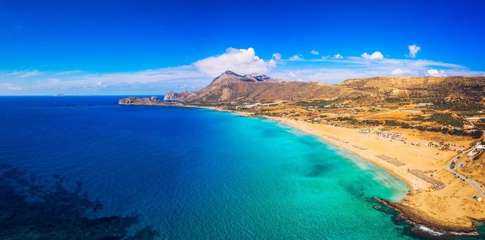 Aerial shot of beautiful turquoise beach Falasarna (Falassarna) in Crete, Greece. View of famous paradise sandy deep turquoise beach of Falasarna (Falassarna) in North West, Crete island, Greece.