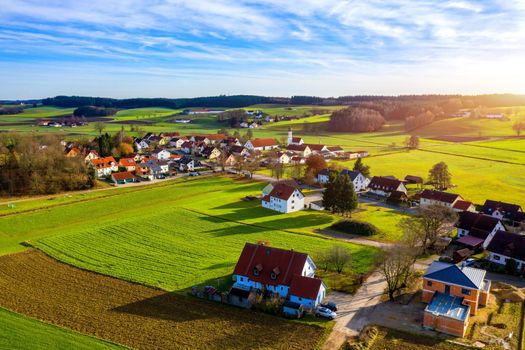 Aerial view of Lampertshausen village in Bavaria. Germany. Picture of an aerial view with a drone of the village Lampertshausen in north Bavaria, Germany.