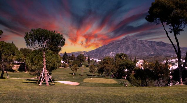 golf course and green  in Marbella, Spain, at sunset