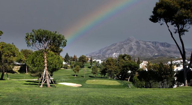 golf course and green  in Marbella, Spain, at sunset