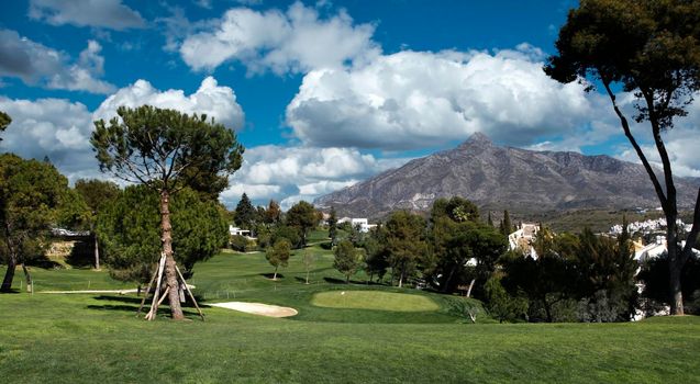 golf course and green  in Marbella, Spain, at sunset