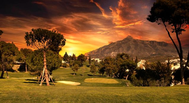 golf course and green  in Marbella, Spain, at sunset