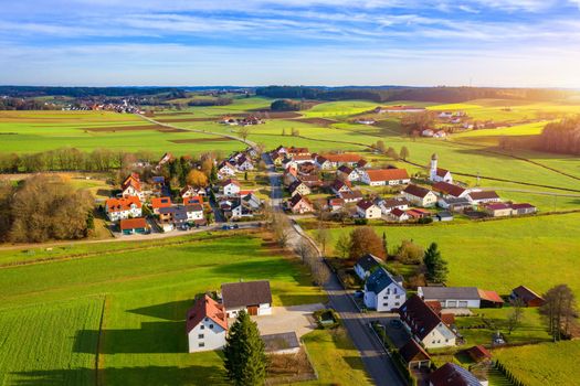 Aerial view of Lampertshausen village in Bavaria. Germany. Picture of an aerial view with a drone of the village Lampertshausen in north Bavaria, Germany.