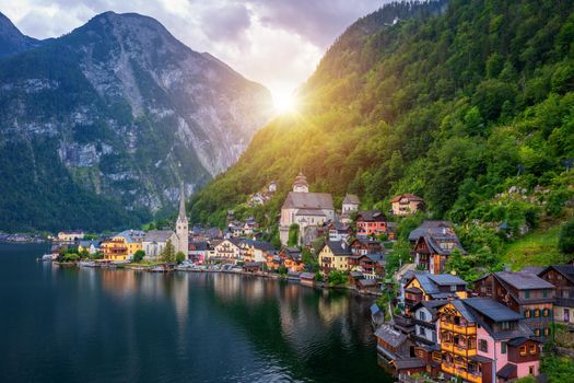 Aerial view of austrian mountain village Hallstatt and Hallstatter lake. Beautiful summer time. Salzkammergut, Austria. Hallstatt village over Hallstatter See, in Salzkammergut, Austria.