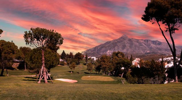 golf course and green  in Marbella, Spain, at sunset