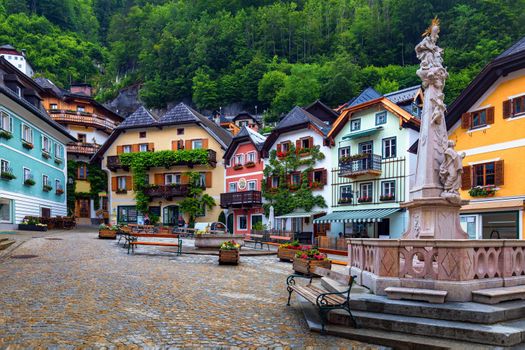Scenic picture-postcard view of famous Hallstatt mountain village in the Austrian Alps, Salzkammergut region, Hallstatt, Austria. Hallstatt village on Hallstatter lake in Austrian Alps.
