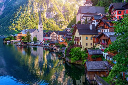 Scenic picture-postcard view of famous Hallstatt mountain village in the Austrian Alps, Salzkammergut region, Hallstatt, Austria. Hallstatt village on Hallstatter lake in Austrian Alps.