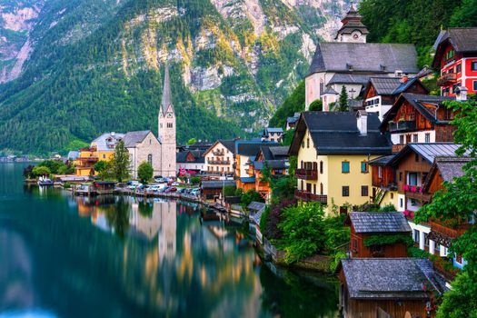 Scenic picture-postcard view of famous Hallstatt mountain village in the Austrian Alps, Salzkammergut region, Hallstatt, Austria. Hallstatt village on Hallstatter lake in Austrian Alps.