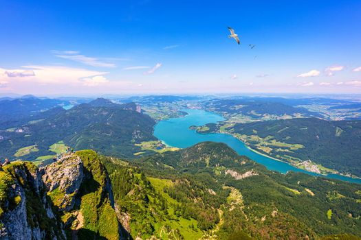 Amazing view from Schafberg by St. Sankt Wolfgang im in Salzkammergut, Haus house Schafbergspitze, lake Mondsee, Moonlake. Blue sky, alps mountains. Upper Austria, Salzburg, near Wolfgangsee, Attersee