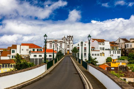 View of Nordeste on Sao Miguel Island, Azores. Old stone arch bridge in Nordeste village, Sao Miguel, Azores. Nordeste village with white town buildings on the island of Sao Miguel, Azores, Portugal.