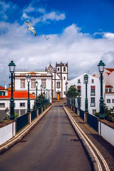 View of Nordeste on Sao Miguel Island, Azores. Old stone arch bridge in Nordeste village, Sao Miguel, Azores. Nordeste village with white town buildings on the island of Sao Miguel, Azores, Portugal.