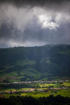 Beautiful nature view on Azores with small villages, tows, green nature fields. Amazing Azores. View of typical Azores village in Sao Miguel island, Azores, Portugal.