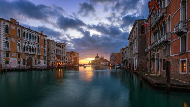 Grand Canal at sunrise in Venice, Italy. Sunrise view of Venice Grand Canal. Architecture and landmarks of Venice. Venice postcard