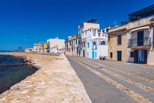 Alghero old town, Alghero street view on a beautiful day. Alghero, Italy. Panoramic aerial view of Alghero, Sardinia, Italy. 