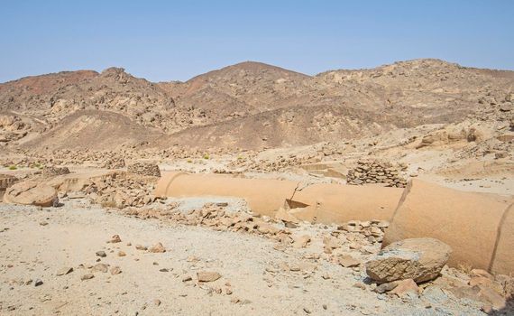 View across old abandoned column pillar at Roman quarry town Mons Claudianus in Egyptian eastern desert