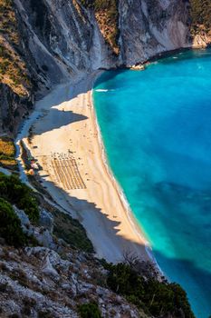 Aerial drone view of iconic turquoise and sapphire bay and beach of Myrtos, Kefalonia (Cephalonia) island, Ionian, Greece. Myrtos beach, Kefalonia island, Greece. Beautiful view of Myrtos beach.