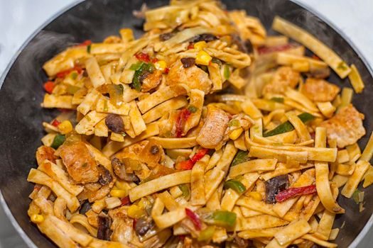 Bami Goreng is a pasta dish. Dish is made on a indonesian way with chicken brast and pasta.