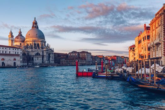 Santa Maria della Salute at Sunrise in Venice, Italy. Canal Grande sunrise of Accademia's bridge. Venice, Italy. Venetian background.