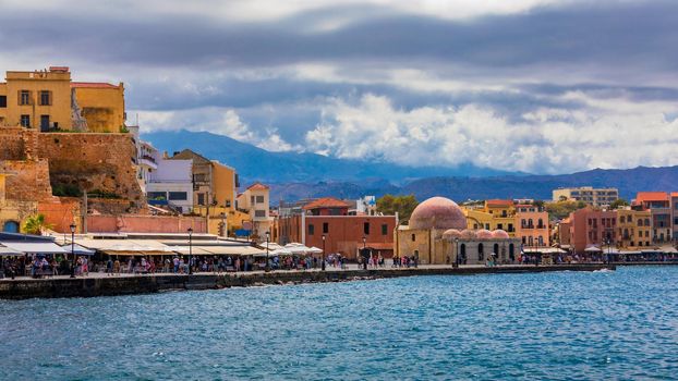 Picturesque old port of Chania. Landmarks of Crete island. Greece. Bay of Chania at sunny summer day, Crete Greece. View of the old port of Chania, Crete, Greece. The port of chania, or Hania. 