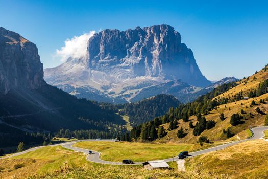 Gardena Pass, Trentino Alto Adige, Italy. Gardena Pass with Sassolungo mountain on the background. Passo Gardena, alpine pass between Val Badia and Val Gardena, South Tyrol, Italy.
