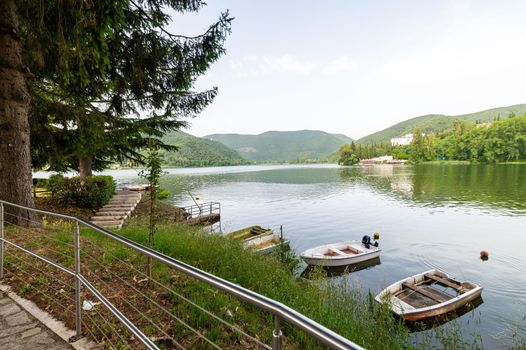 piediluco,italy june 23 2021:piediluco lake with boats by the lake