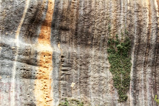 Mountain wall with colorful streaks in the Sierra of Alcaraz, Castile-la Mancha community, Spain