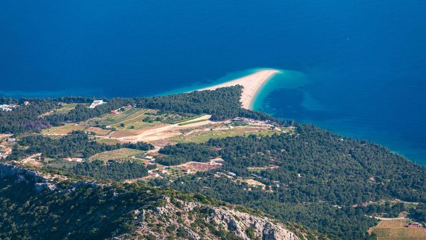 Beautiful panorama of famous Adriatic beach Zlatni Rat (Golden Cape or Golden Horn) with turquoise water , Island of Brac Croatia summertime. Famous Adriatic beach Zlatni Rat in Bol, Brac, Croatia.