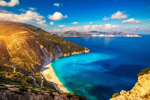Famous Myrtos beach from overlook, Kefalonia (Cephalonia), Greece. Myrtos beach, Kefalonia island, Greece. Beautiful view of Myrtos beach, Ionian Island, Kefalonia (Cephalonia), Greece.