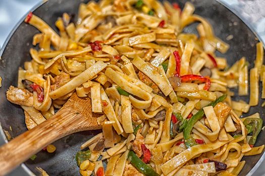 Bami Goreng is a pasta dish. Dish is made on a indonesian way with chicken brast and pasta.