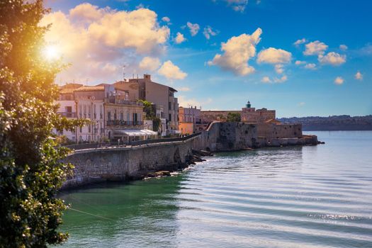 Siracusa, Ortigia Island, Sicily, Italy. Isola di Ortigia, coast of Ortigia island at city of Syracuse, Sicily, Italy. Coastline town Syracuse, Sicily and old Ortigia island.
