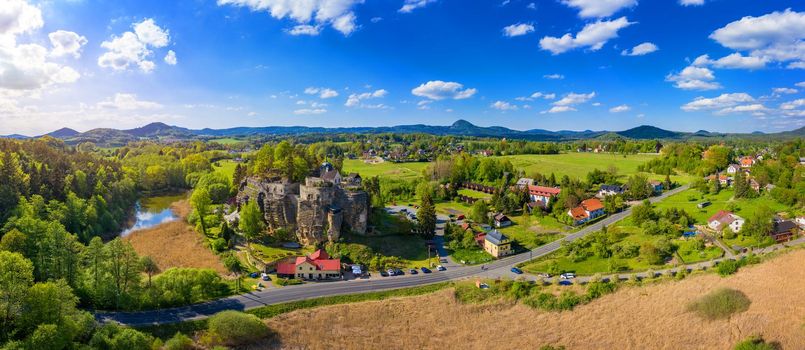 Aerial view of Sloup Castle in Northern Bohemia, Czechia. Sloup rock castle in the small town of Sloup v Cechach, in the Liberec Region, north Bohemia, Czech Republic. 