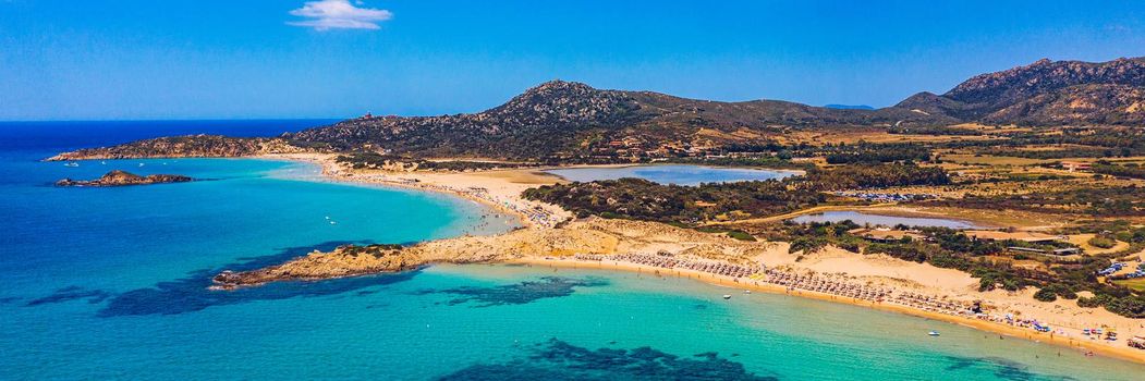 Panorama of the wonderful beaches of Chia, Sardinia, Italy. View of beautiful Chia bay and wonderful beaches, Sardinia island, Italy. Beautiful sea and bay on Su Guideu beach, Sardinia island, Italy