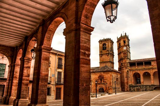 Renaissance square in Alcaraz called Plaza Mayor with the Tardon and the Trinidad Towers.