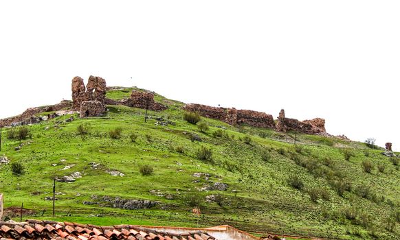 Old castle ruins in the mountain of Alcaraz in a cloudy day of spring. Alcaraz, Albacete, Spain.
