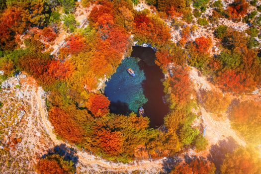 Melissani Cave with autumn colors. Famous Melissani lake on Kefalonia island, Karavomylos, Greece. On top of Melissani Cave (Melissani Lake) in Karavomylos village in Kefalonia island , Greece. 